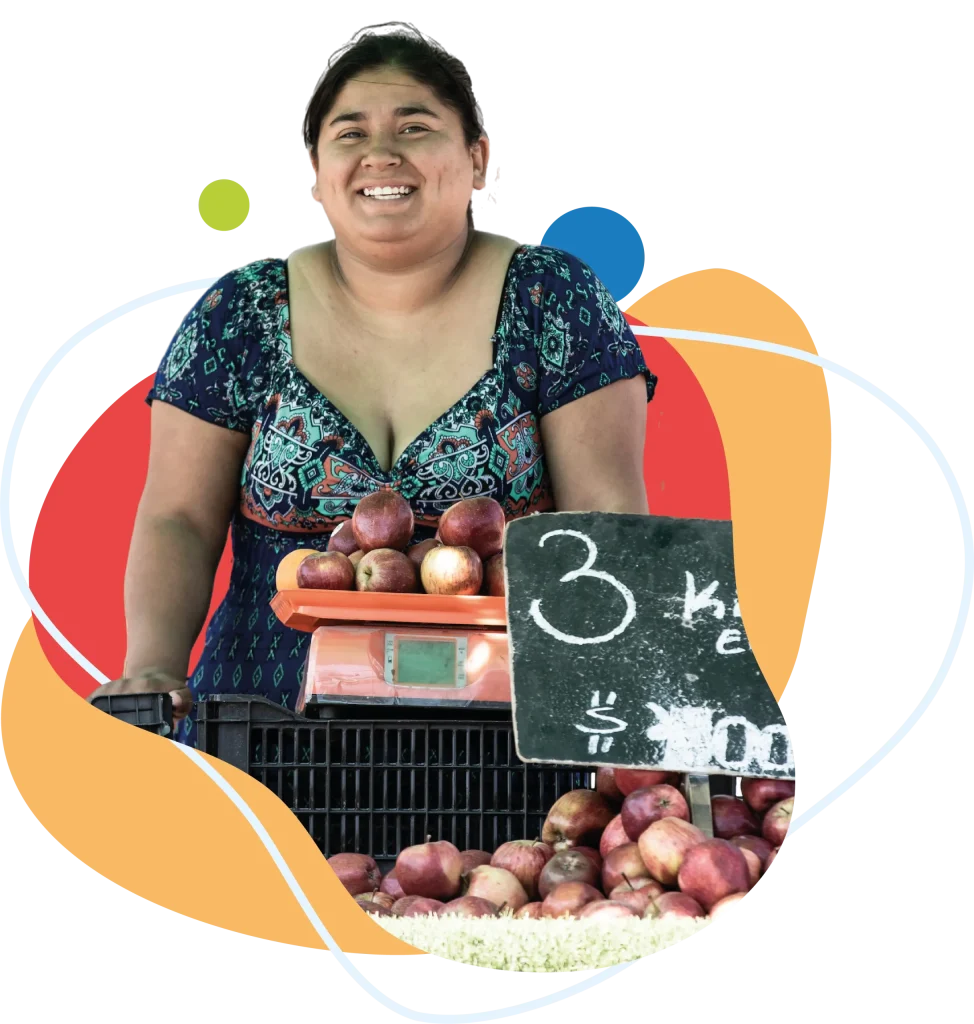 Un arte gráfico de una mujer emprendedora en una feria, la mujer sonríe feliz, bajo ella hay una pesa con manzanas a la venta.